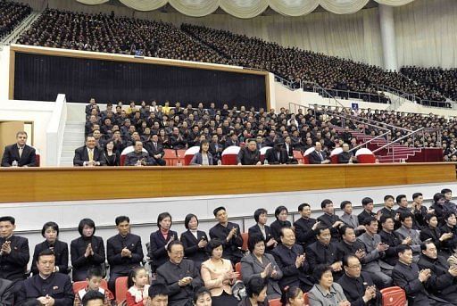 North Korean leader Kim Jong-Un (C), and former NBA star Dennis Rodman at a basketball game in Pyongyang, March 1, 2013